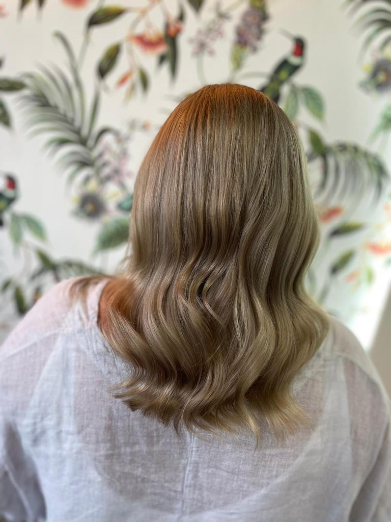 After tight weave highlights and root smudge