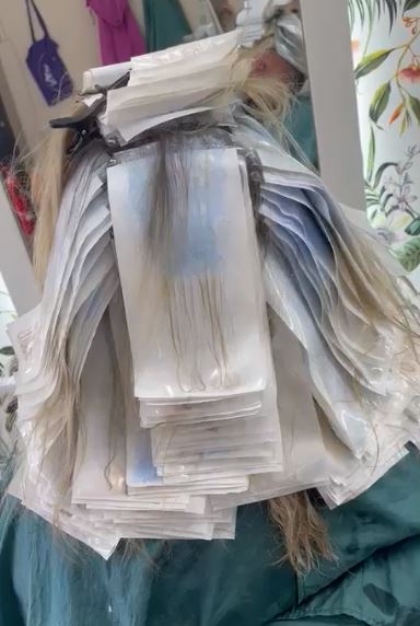 During tight weave highlights and root smudge