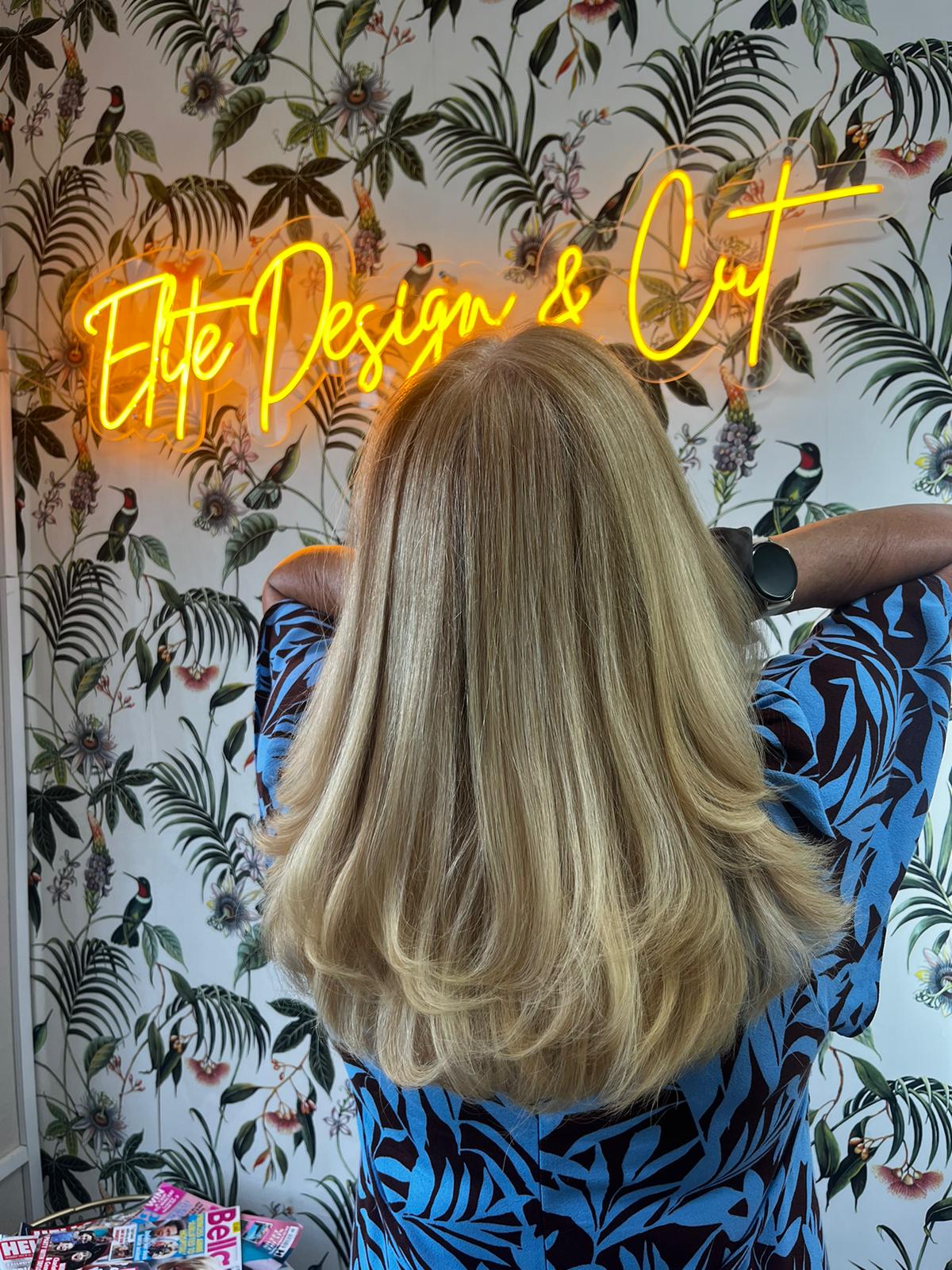 wash and layered cut bouncy blow dry